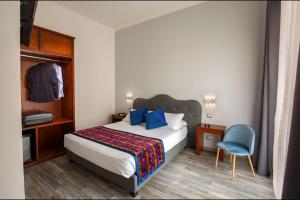 Posteľ alebo postele v izbe v ubytovaní Prima Guest House Collection