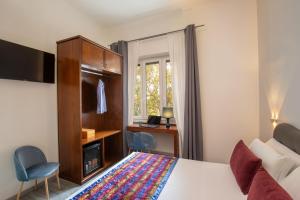 Posteľ alebo postele v izbe v ubytovaní Prima Guest House Collection