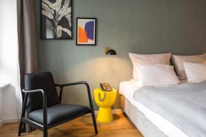 En eller flere senge i et værelse på Genusshotel Krone & Roadtrips bei Basel