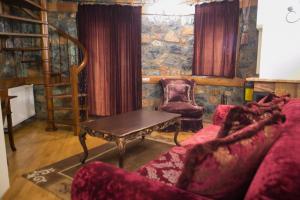 Posezení v ubytování Montecristo Chalet
