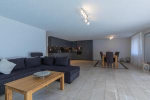 Posezení v ubytování Schilthorn Apartment - Aare Jungfrau AG