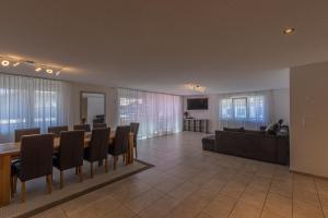 TV a/nebo společenská místnost v ubytování Schilthorn Apartment - Aare Jungfrau AG