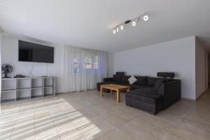 Posezení v ubytování Schilthorn Apartment - Aare Jungfrau AG