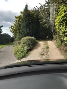 a view of a dirt road from a car at Lodge in Yeovil