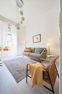 Posezení v ubytování Praça da Figueira Elegance by MSapartments