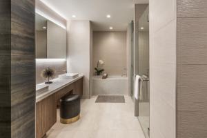 a bathroom with a shower, sink, and toilet at Mountain Shadows Resort Scottsdale in Scottsdale