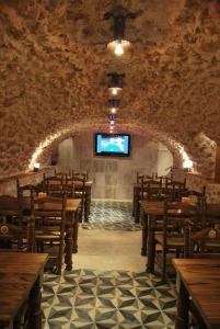 Un restaurante o sitio para comer en Hotel Rural Casa Grande Almagro