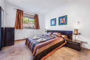 Postel nebo postele na pokoji v ubytování Villa Marioma + 37 fotografií