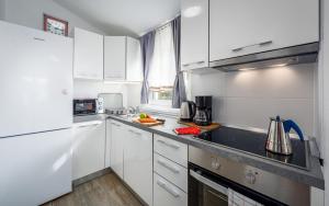 Kuchyň nebo kuchyňský kout v ubytování Apartment Kraljevic