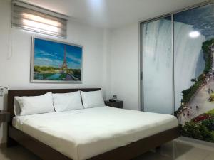 Katil atau katil-katil dalam bilik di Hotel Suites Caribe