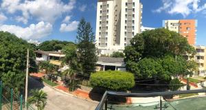 a view from the balcony of a building in a city at Hotel Suites Caribe in Barranquilla