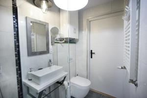 Kúpeľňa v ubytovaní Apartament Zdrojowy + 13 fotografií