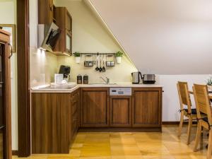 Kuchyňa alebo kuchynka v ubytovaní Apartament Zacisze pod Giewontem