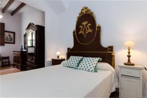 Säng eller sängar i ett rum på Jaume II