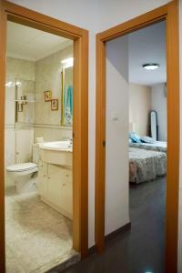 Ванна кімната в Bonito apartament a 3 minutos de la playa