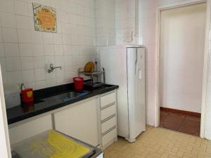 Virtuvė arba virtuvėlė apgyvendinimo įstaigoje Pé na Areia