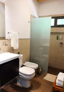 Ванна кімната в CAYE Guest House