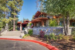a house with a sign in front of it at Tuna Bush in Truckee
