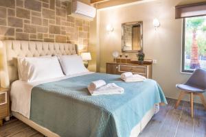 Posteľ alebo postele v izbe v ubytovaní Villa Elenitsa + 21 fotografií