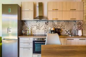 A kitchen or kitchenette at Villa Elenitsa