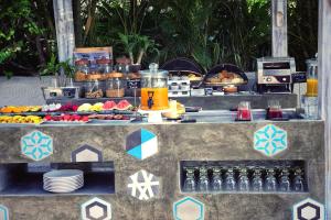 a buffet of food and drinks on a table at Sailing Club Resort Mui Ne in Mui Ne