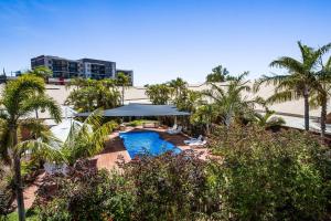 an aerial view of a resort with a swimming pool at Karratha Central Apartments in Karratha
