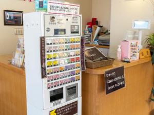 a refrigerator in a store with a counter at Aguri Kobo Mabu in Otoebokke