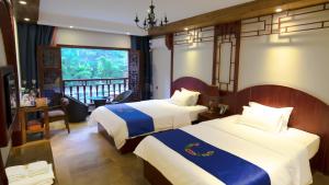 Billede fra billedgalleriet på Fenghuang Tujia Ethnic Minority River View Hotel i Fenghuang