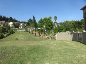 a view of a yard with a cemetery at Cul de Sac - Accommodation in George