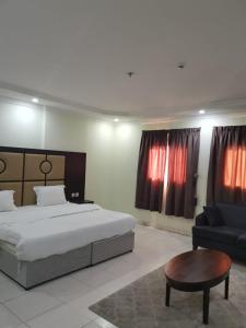 Postel nebo postele na pokoji v ubytování شقق دخيل بن نقا بن شنيشيل الرحيلي للشقق المخدومة