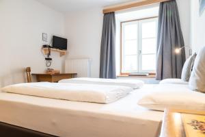 A bed or beds in a room at Villa Alba