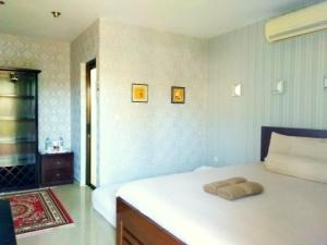 Voodi või voodid majutusasutuse Jos & Hanny Homestay toas