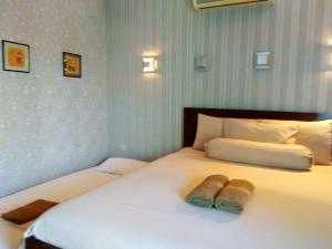 Voodi või voodid majutusasutuse Jos & Hanny Homestay toas