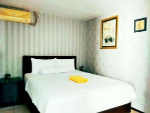 Voodi või voodid majutusasutuse Jos & Hanny Homestay toas