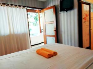 Voodi või voodid majutusasutuse Jos & Hanny Homestay toas