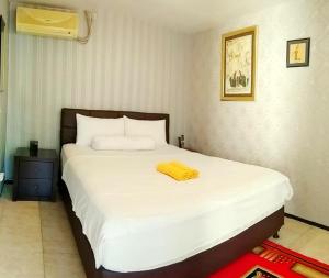Voodi või voodid majutusasutuse Jos & Hanny Homestay toas