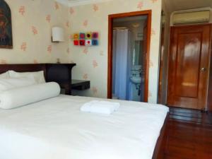 Voodi või voodid majutusasutuse Jos & Hanny Homestay toas