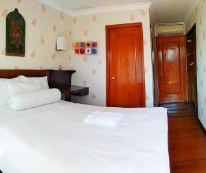 Voodi või voodid majutusasutuse Jos & Hanny Homestay toas