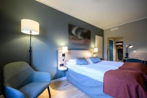 Postel nebo postele na pokoji v ubytování Quality Hotel Saga