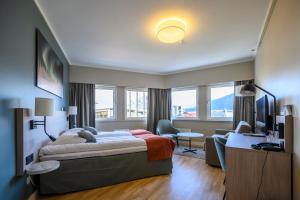 Postel nebo postele na pokoji v ubytování Quality Hotel Saga