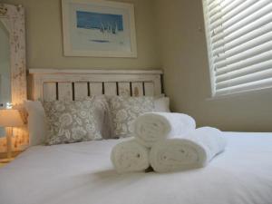 Postel nebo postele na pokoji v ubytování 57 Whale Rock Estate + 4 fotografie