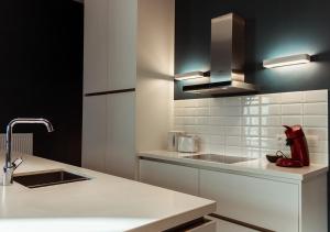 A cozinha ou kitchenette de Smartflats - Rubens Antwerp