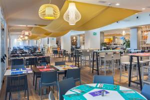 Een restaurant of ander eetgelegenheid bij Abora Buenaventura by Lopesan Hotels