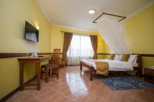 Televisor o centre d'entreteniment de ACK Guest House Nairobi