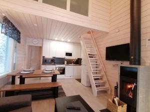 TV a/nebo společenská místnost v ubytování Rukantrio Apartments