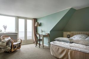 Postel nebo postele na pokoji v ubytování Helenekilde Badehotel