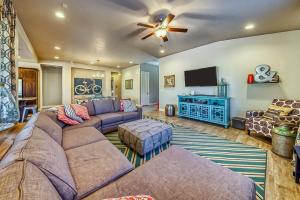 a living room with a couch and a flat screen tv at Splash Pad Place: Paradise Village #29 in Santa Clara