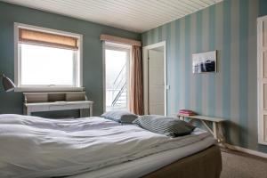 Postel nebo postele na pokoji v ubytování Helenekilde Badehotel