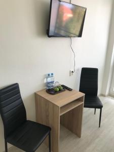 Μια τηλεόραση ή/και κέντρο ψυχαγωγίας στο Ubytovanie Novohrad