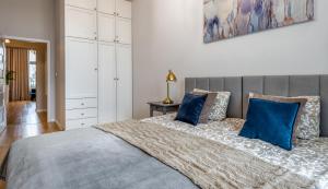 Posteľ alebo postele v izbe v ubytovaní Apartament Diamentowy